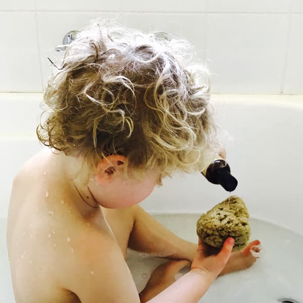 Baby Using Four Cow Farm Baby Wash